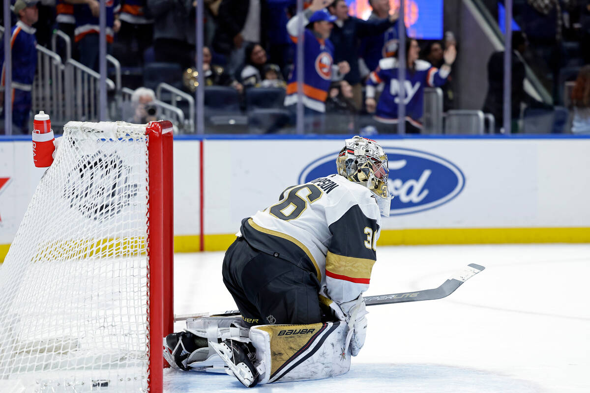 Vegas Golden Knights goaltender Logan Thompson reacts after giving up a goal to New York Island ...
