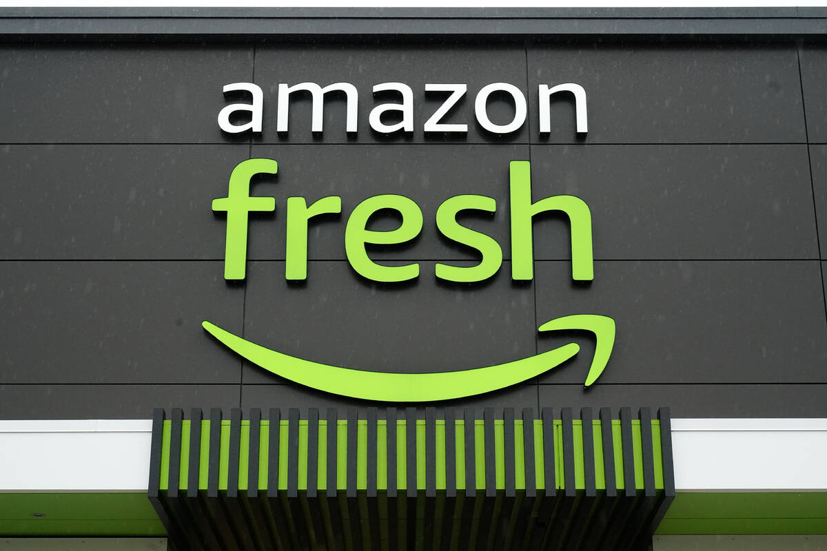 FILE - An Amazon Fresh grocery store stands in Warrington, Pa., on Feb. 4, 2022. In an email to ...