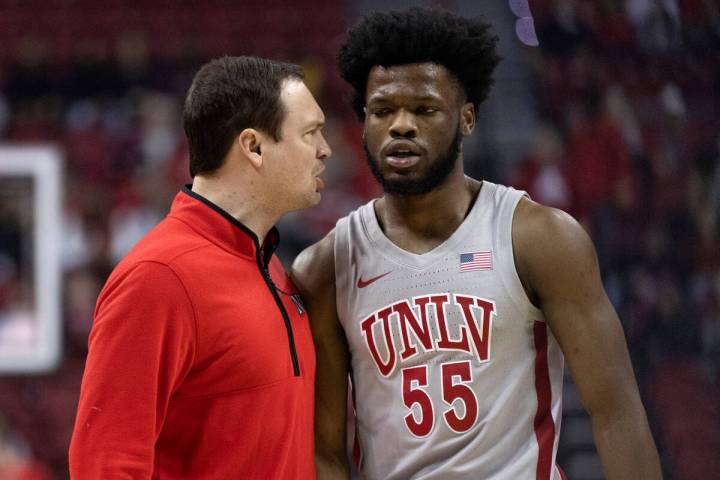 FILE - UNLV Rebels head coach Kevin Kruger shouts at guard EJ Harkless (55) in a timeout during ...