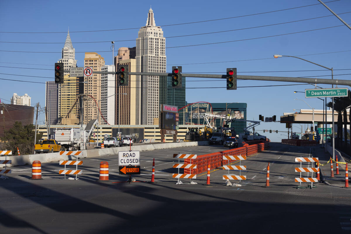 The Tropicana Avenue exit is closed as workers demolish the bridge, in Las Vegas, on Saturday, ...