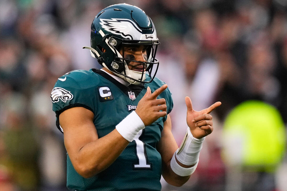Philadelphia Eagles quarterback Jalen Hurts gestures during the first half of the NFC Champions ...