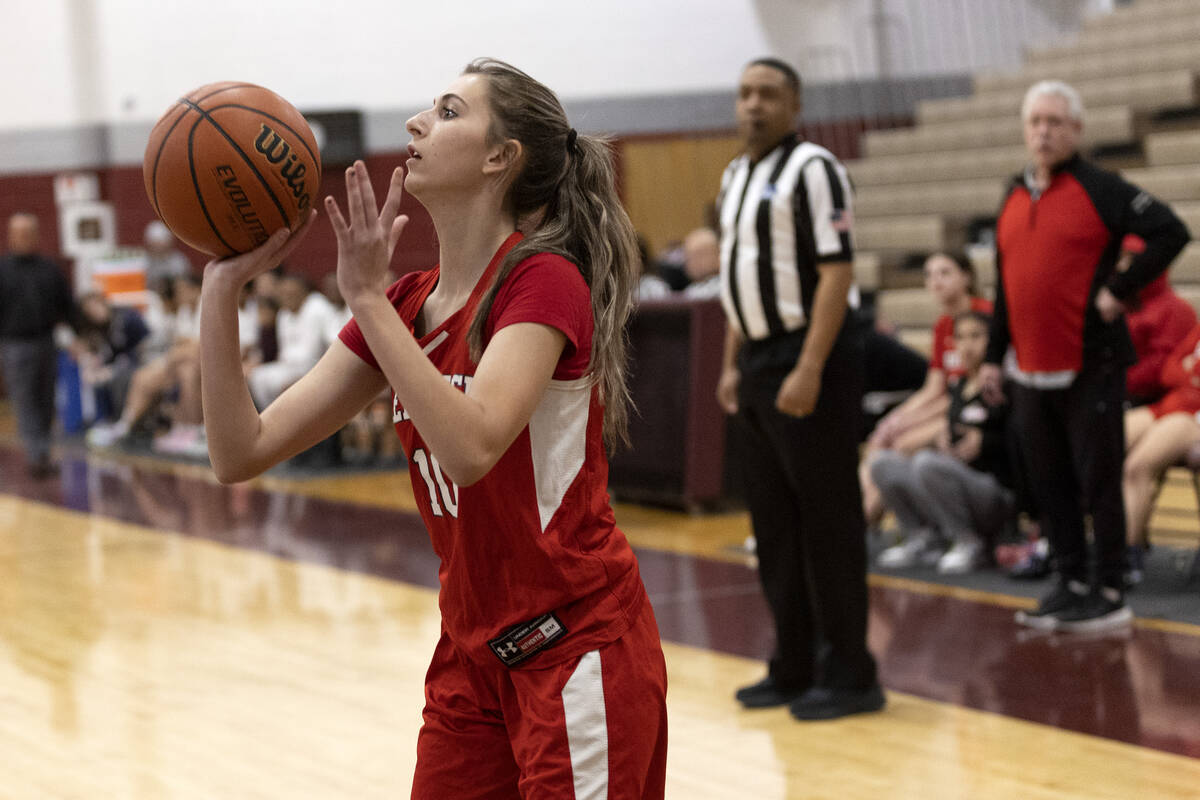 Doral’s Emma Thompson (10) prepares to shoot during a girls high school basketball game ...