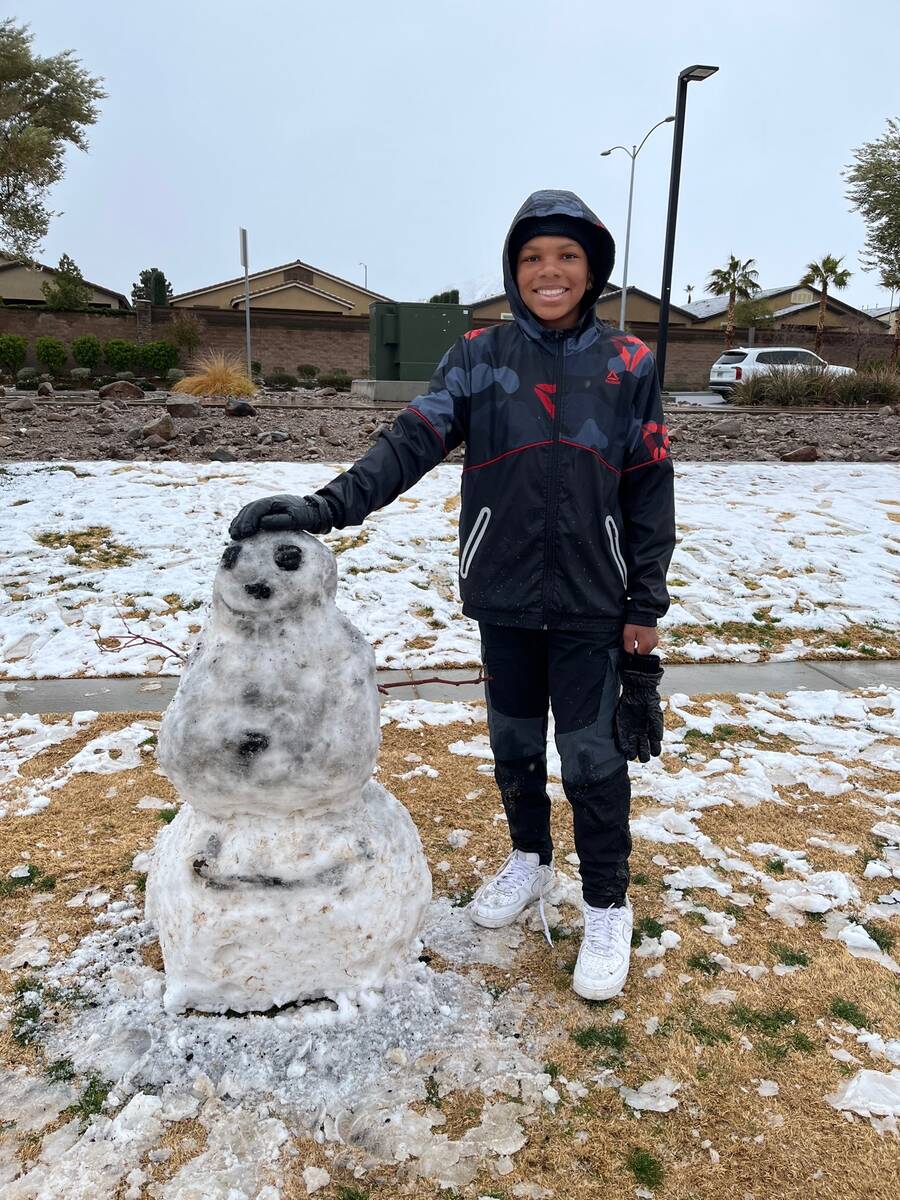 6th-grader Daylen with his snowman at McCullough Vista Park