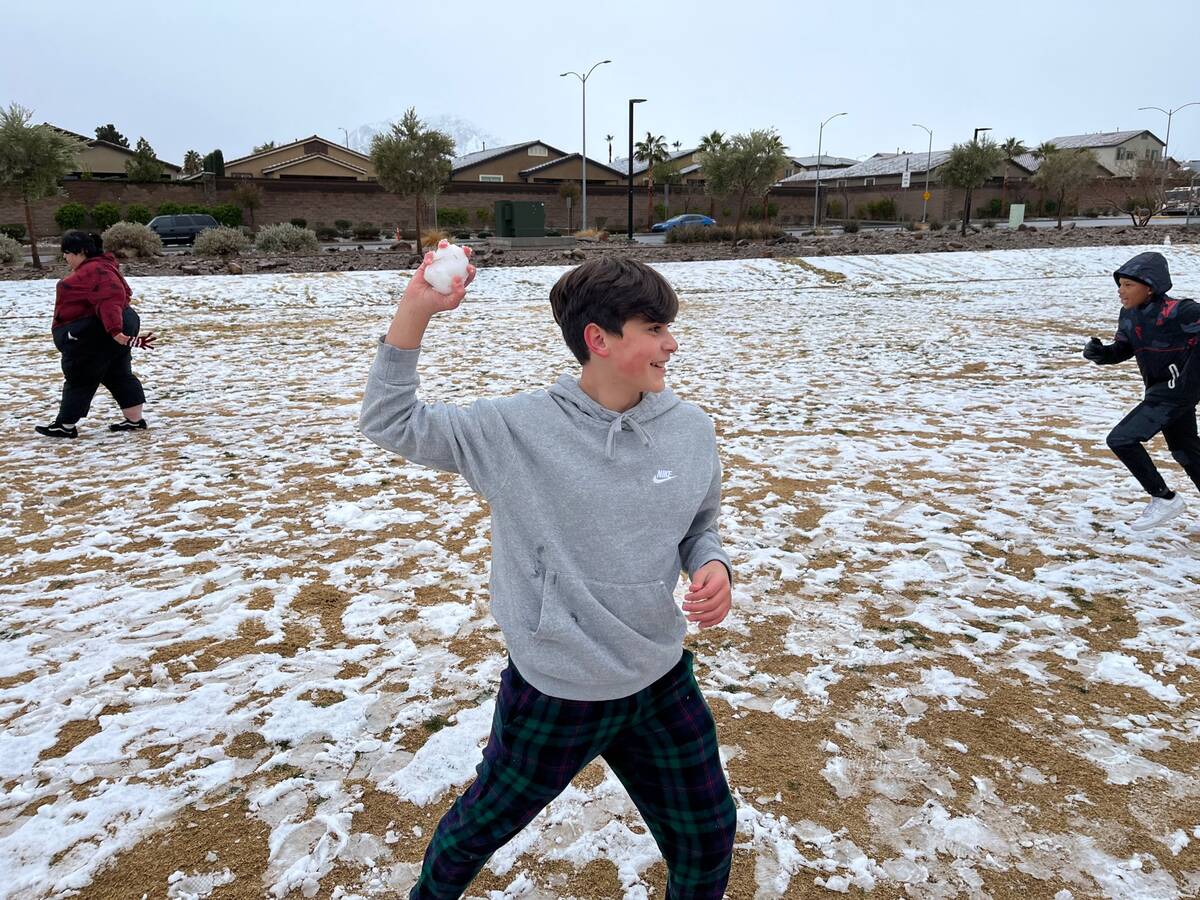 8th-grader Ayden Soto throwing a snowball at McCullough Vista Park
