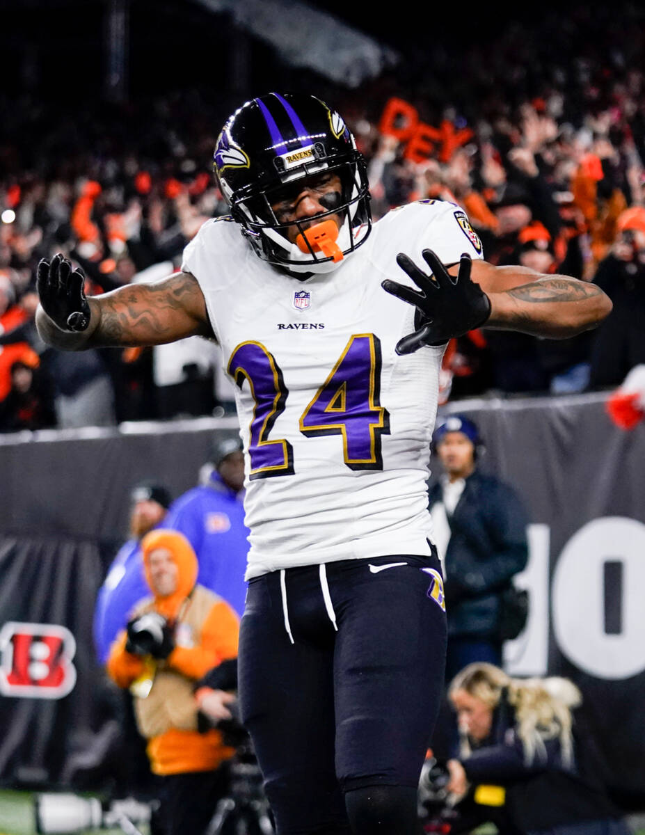 Baltimore Ravens cornerback Marcus Peters (24) reacts after breaking up a pass during a wild-ca ...