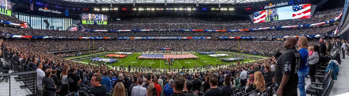 Fans stand for the National Anthem as the Raisers will face Indianapolis Colts during the first ...