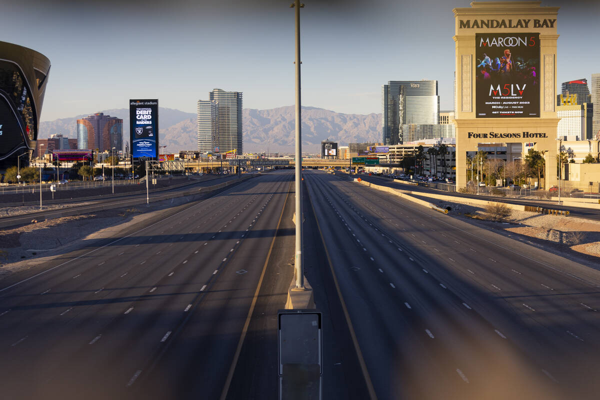The completely closed I-15 freeway between Russell and Flamingo roads is seen from near the Rus ...