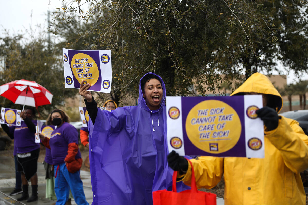 Jocelyn White, an SEIU Local 1107 staff member, participates in a picket in support of health c ...