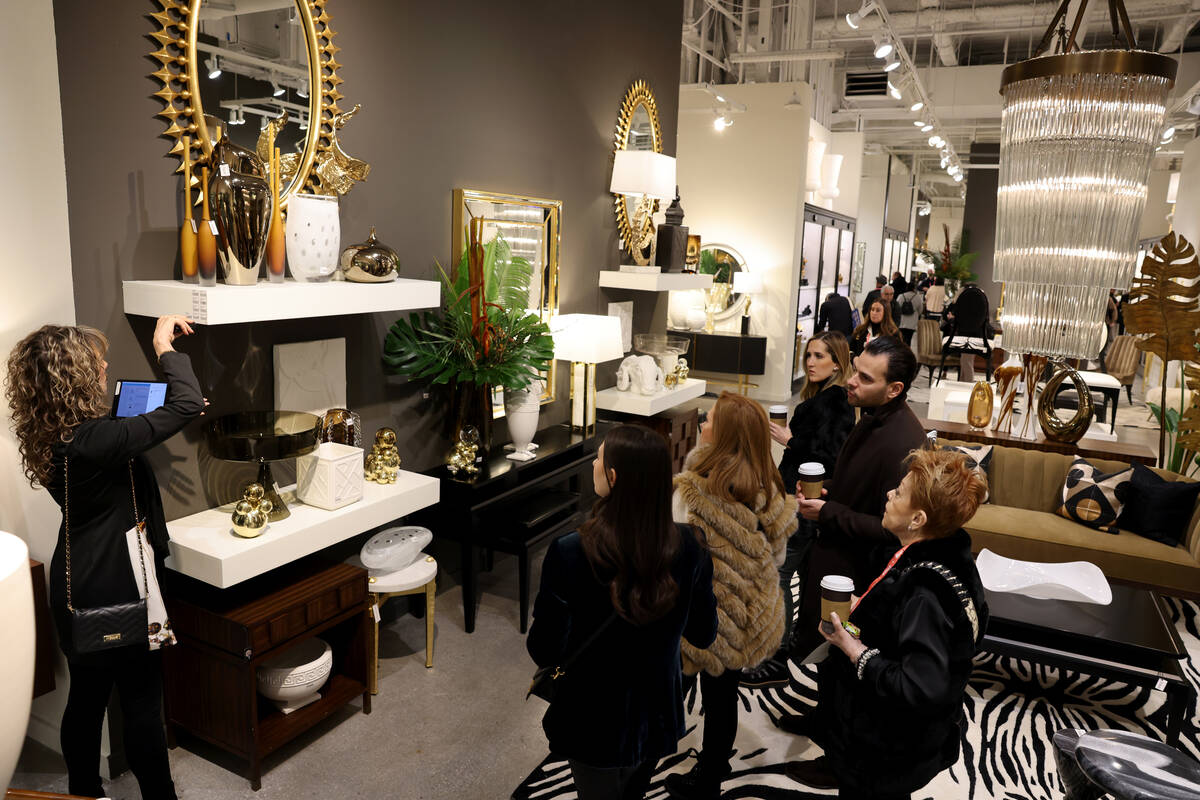Conventioneers browse in the Global Views showroom during the biannual Las Vegas Market home fu ...