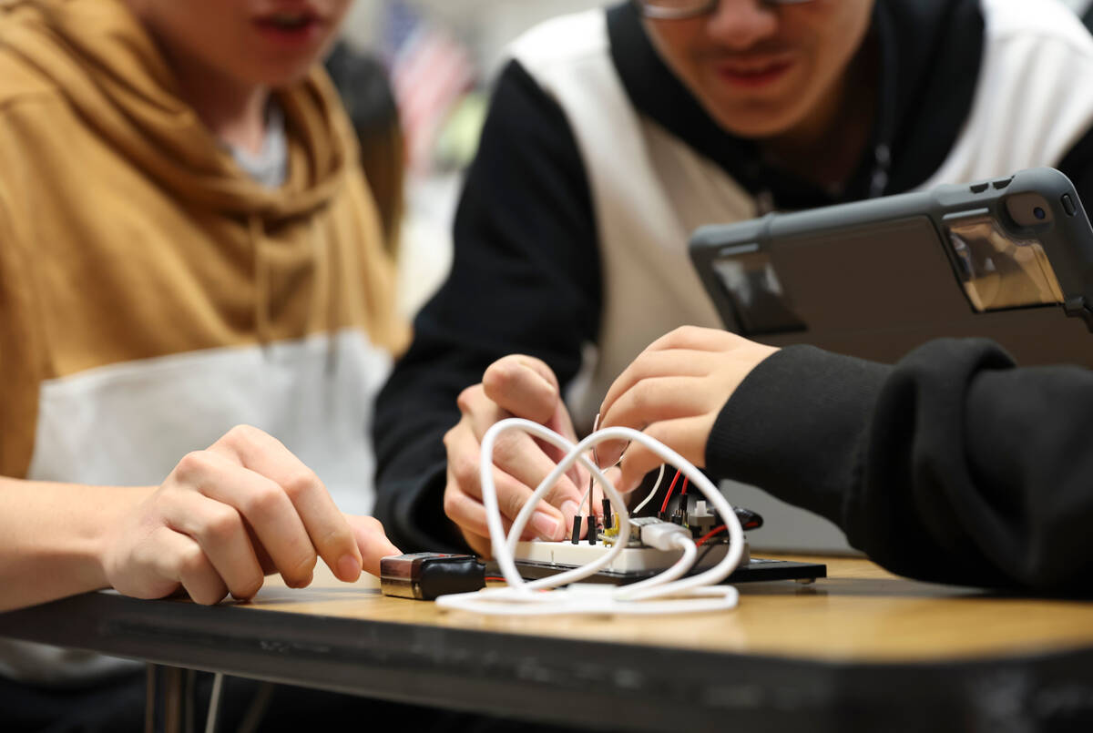 Students work with circuits in a project during their U.S. Space Force Junior ROTC program clas ...