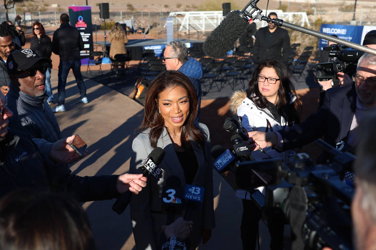Sandra Douglass Morgan, center, president for the Raiders, speaks to the press following a NFL ...