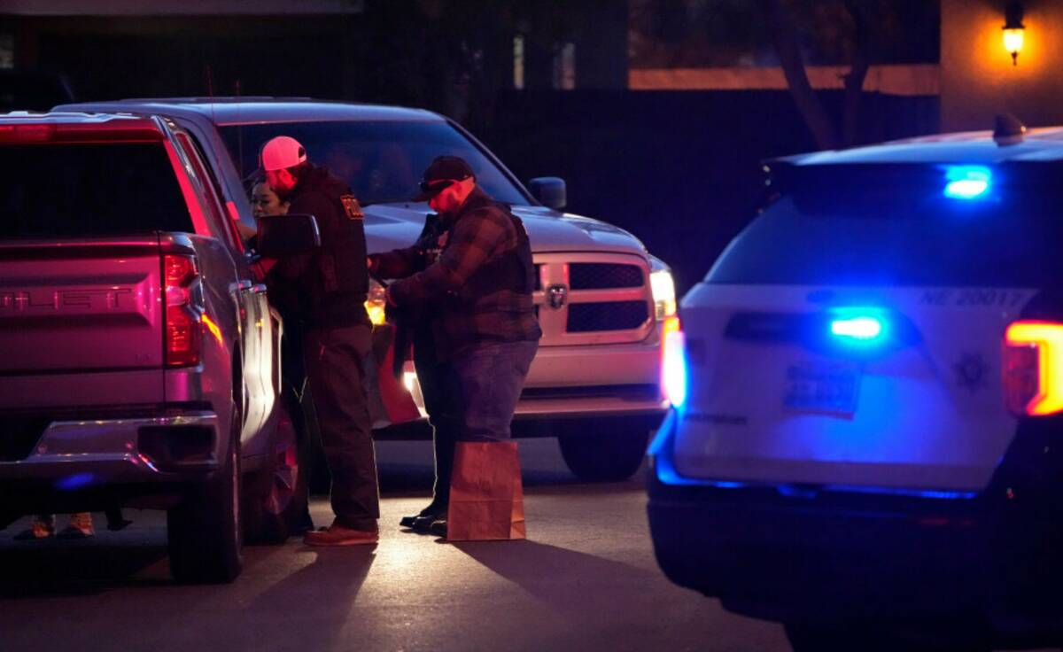 Las Vegas police work near the home of former actor Nathan Lee Chasing His Horse, who goes by N ...