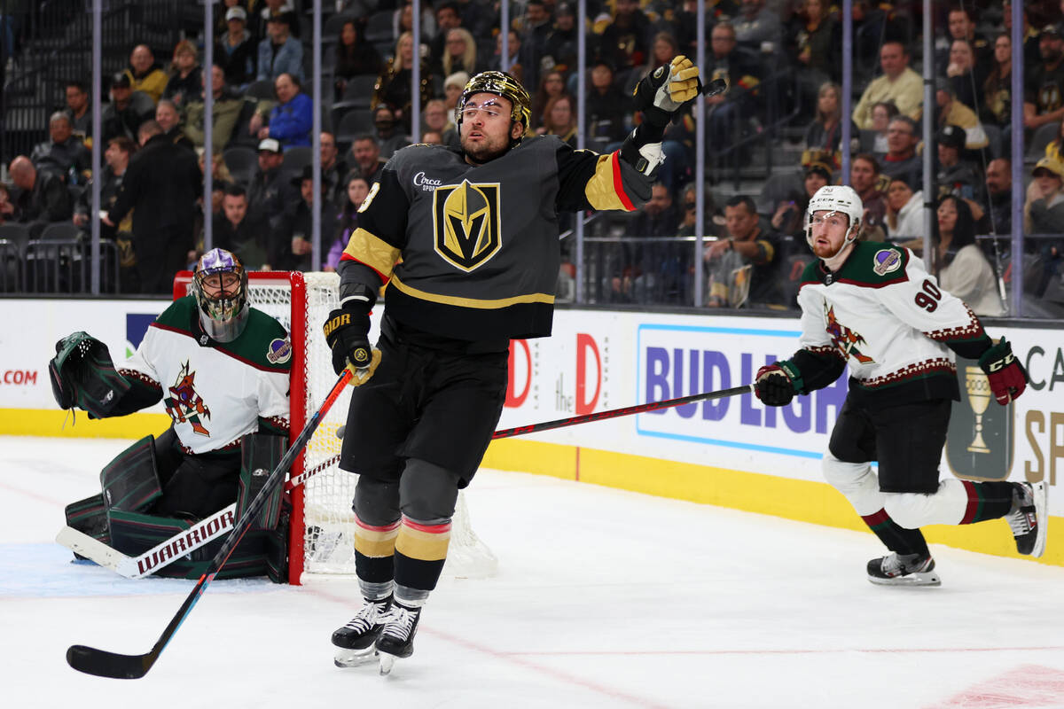 Vegas Golden Knights left wing William Carrier (28) stops a puck in the air during the third pe ...