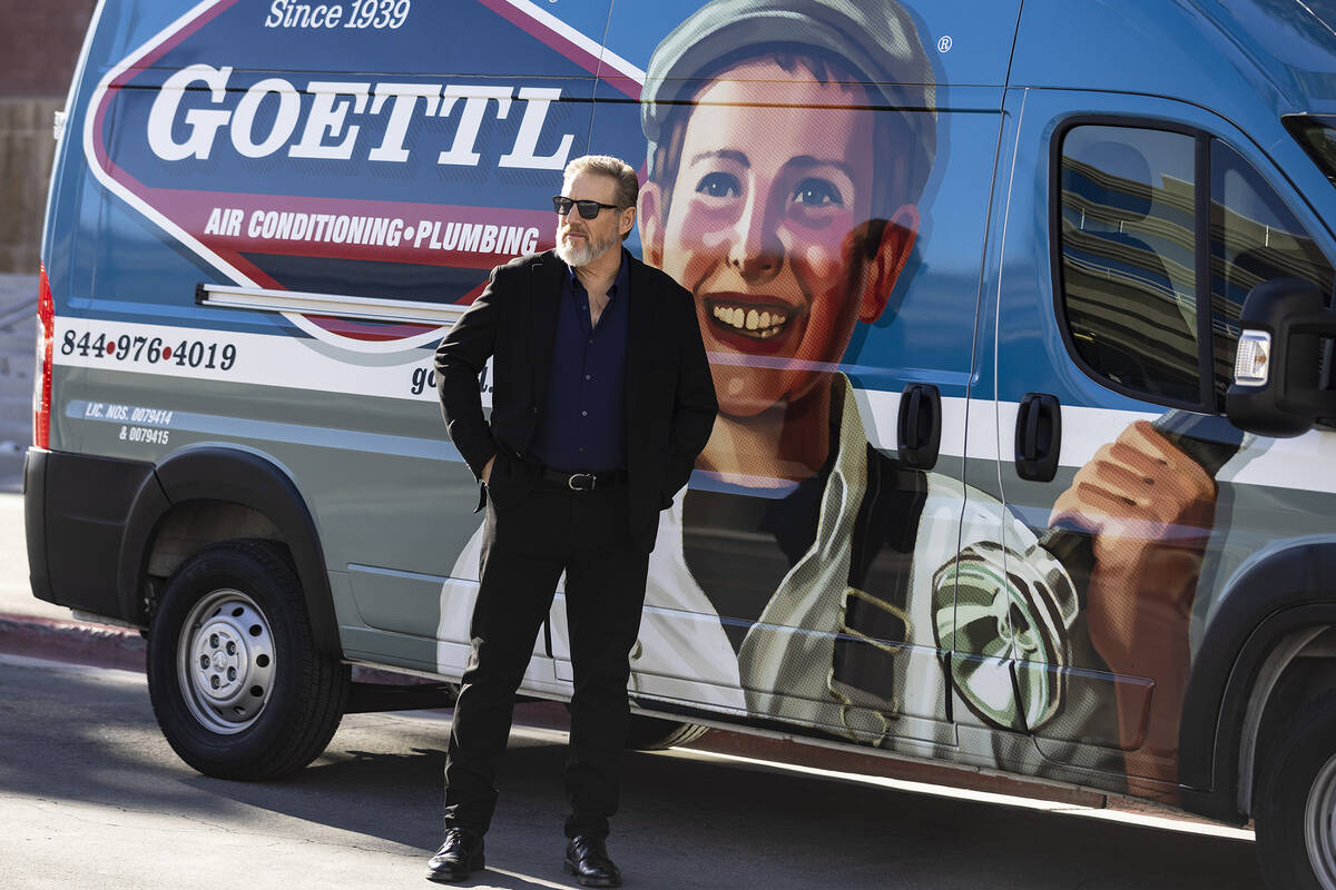 Ken Goodrich, CEO of Goettl, poses for a photo in front of his company's van, on Tuesday, Jan. ...
