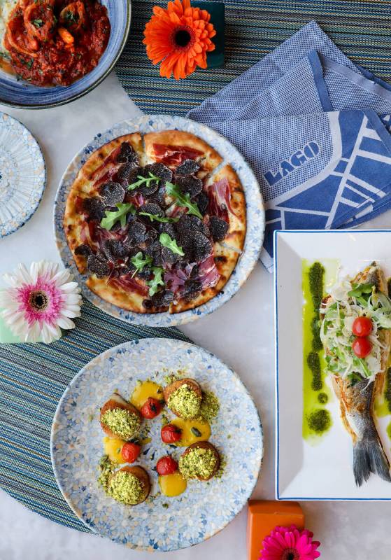 Lasagna with shrimp arrabiata, clockwise from left, the Lago pizzetta, grilled branzino, and se ...