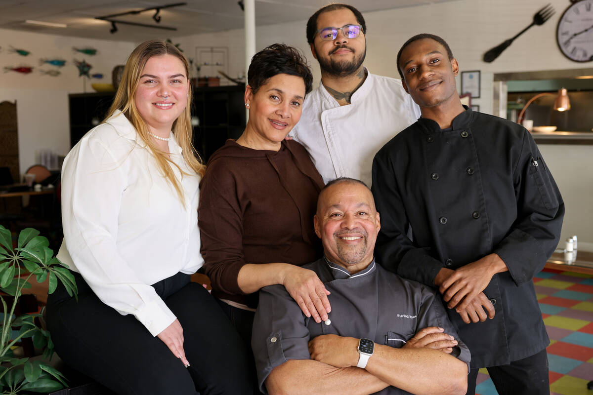 Sterling Burpee, chef and owner of Zenaida's Cafe, seated, with his team, from left, Jaydin Faz ...