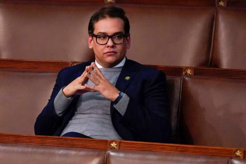 Rep. George Santos, R-N.Y., waits for the start of a session in the House chamber as the House ...