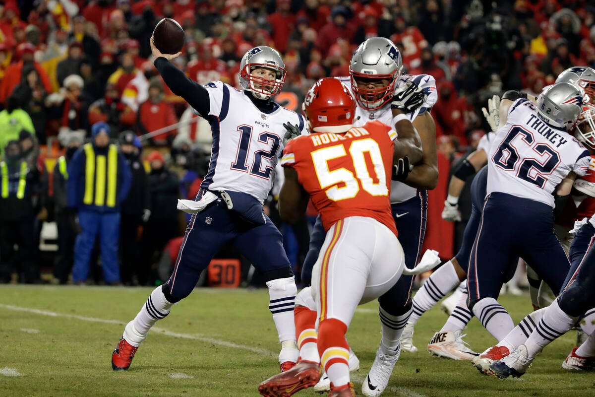 New England Patriots quarterback Tom Brady (12) throws a pass during the second half of the AFC ...