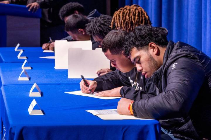 Six of the Desert Pines High School football players sign with college programs on Wednesday, F ...