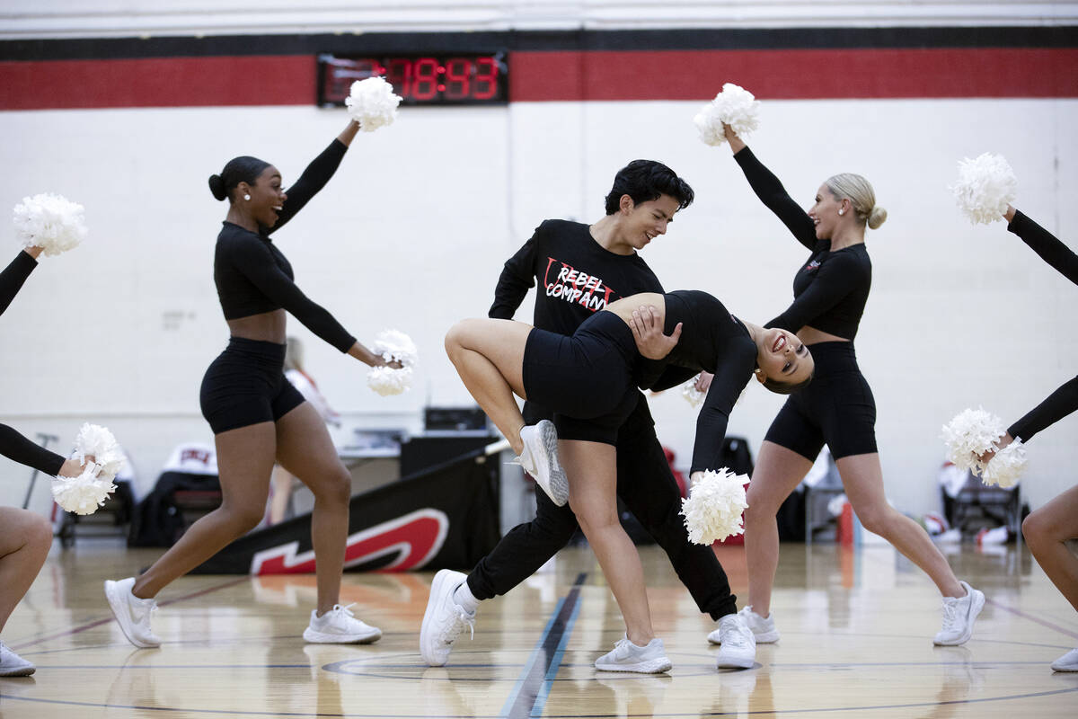 The Rebel Girls & Company, including freshman Jonathan Jaramillo, center left, and senior capta ...