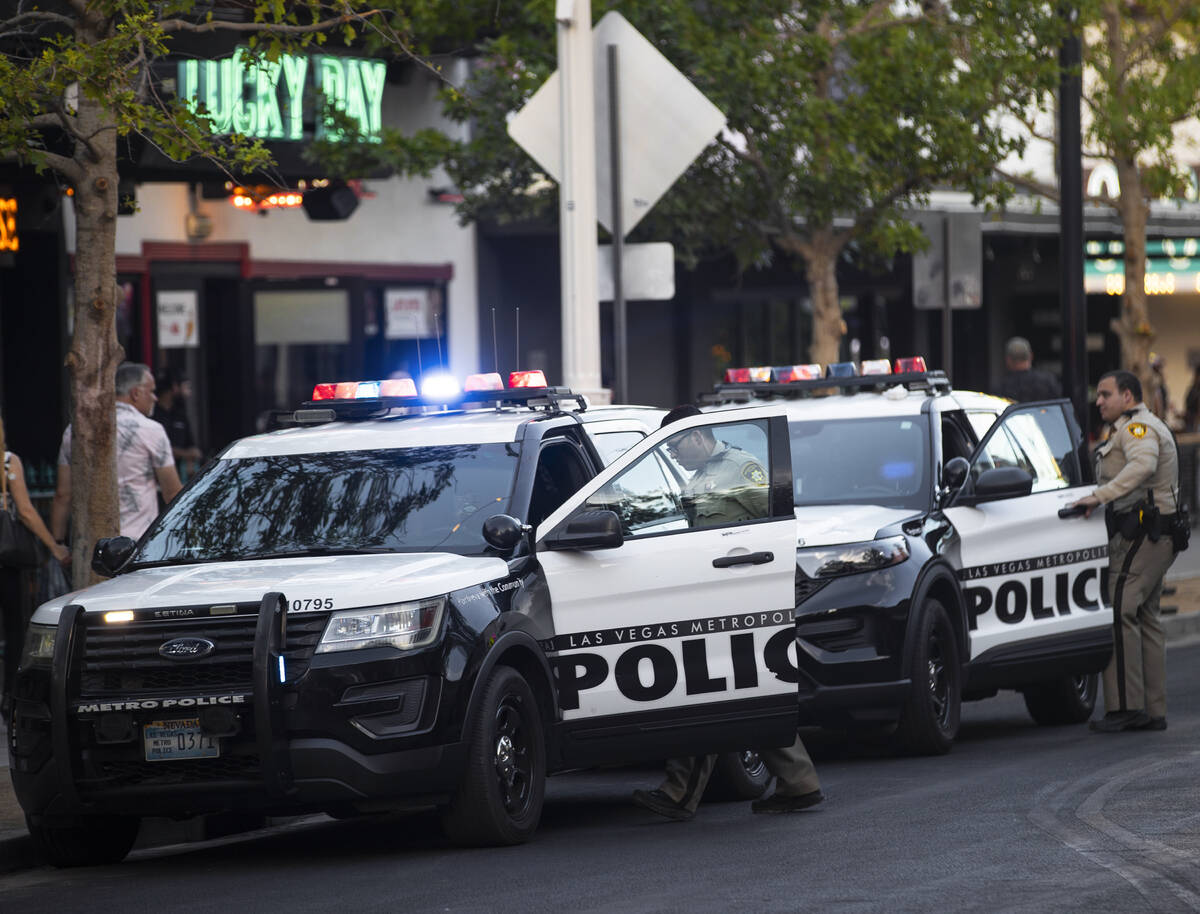 Las Vegas Metro officers park outside the Fremont Street Experience on Saturday, July 9, 2022, ...