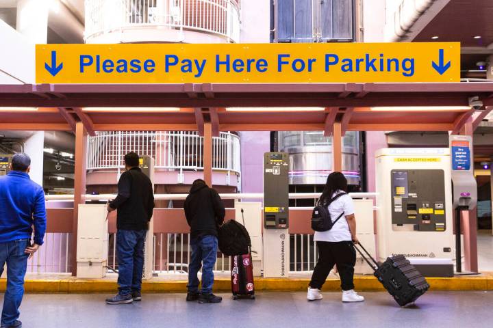Arriving passengers pay their parking fee at the level 2 of Terminal 1 parking lot at Harry Rei ...