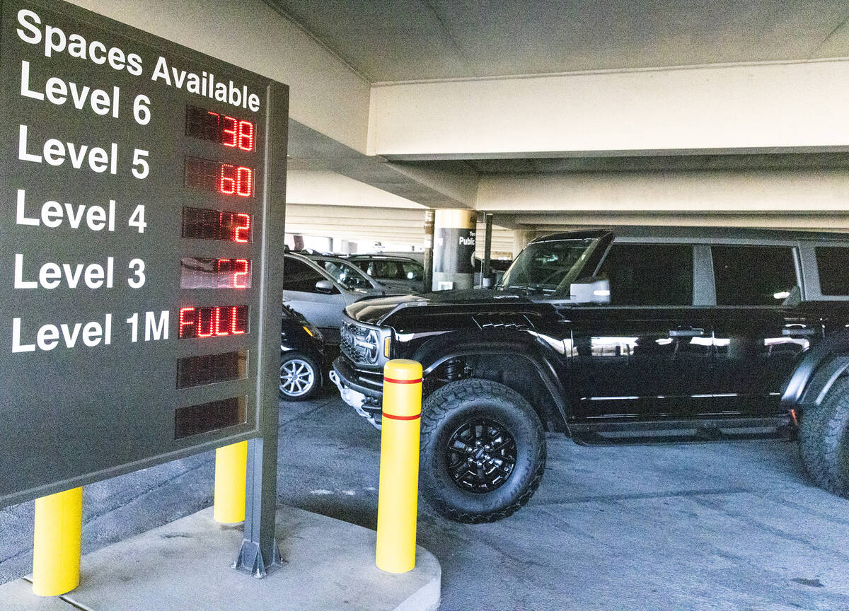 An electronic message board displays the available parking spaces at the level 2 of Terminal 1 ...
