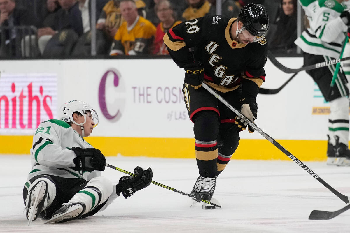 Dallas Stars left wing Jason Robertson (21) and Vegas Golden Knights center Chandler Stephenson ...