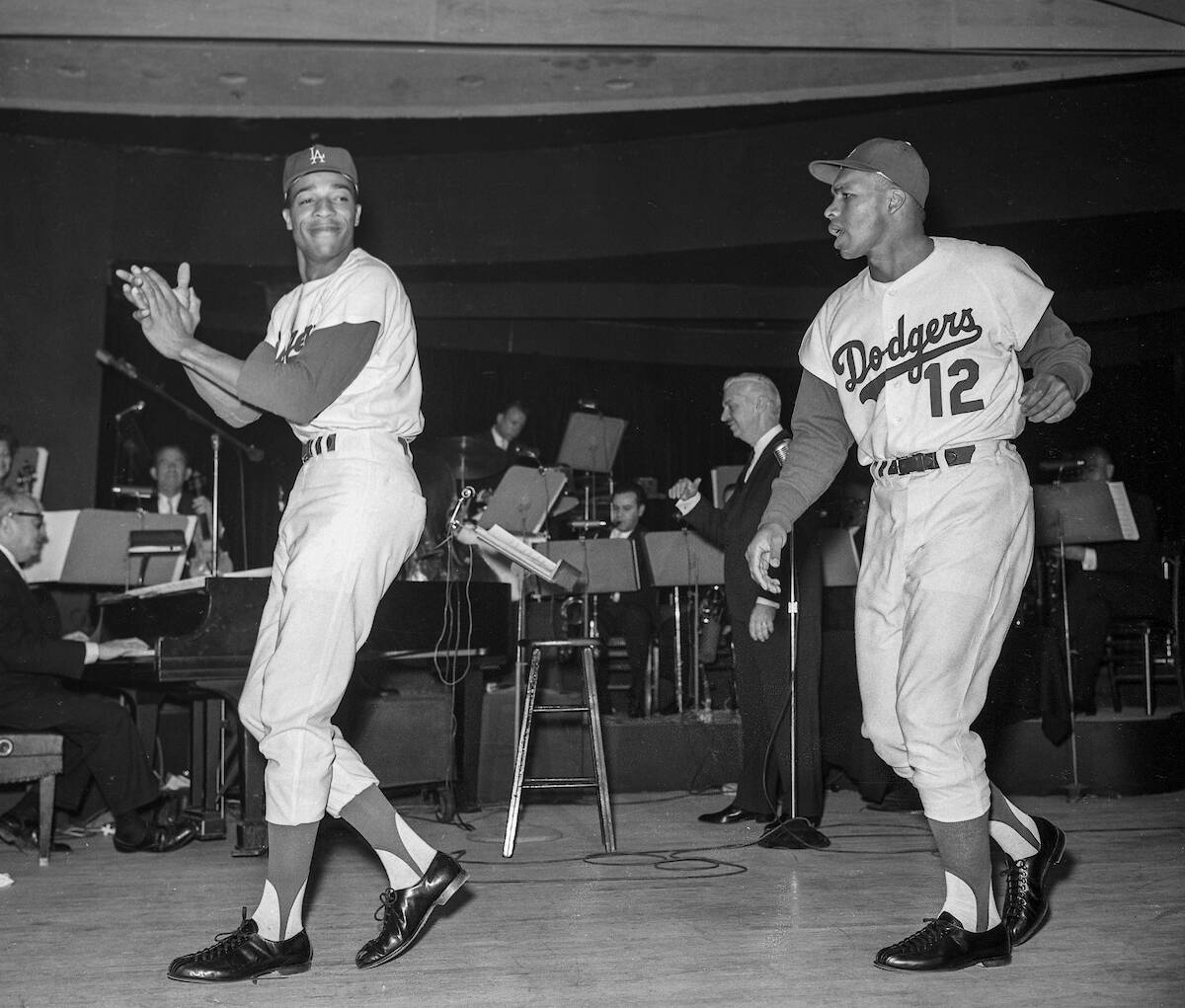 Los Angeles Dodgers Willie Davis (3) and Tommy Davis (12) perform with other Dodgers and Joey B ...
