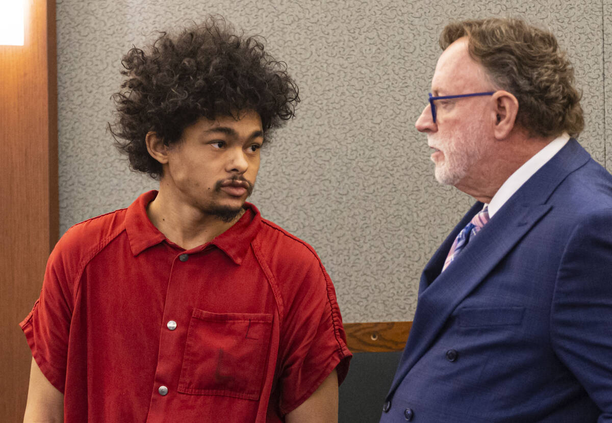 Tyson Hampton, charged in the fatal shooting of officer Truong Thai, appears in court with defe ...
