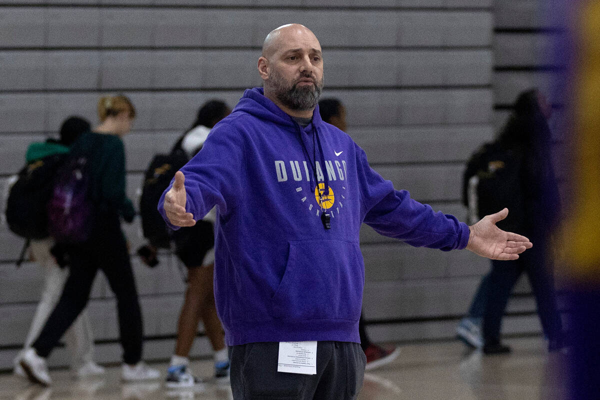 Durango head coach Chad Beeten works with his team during a boys high school basketball practic ...