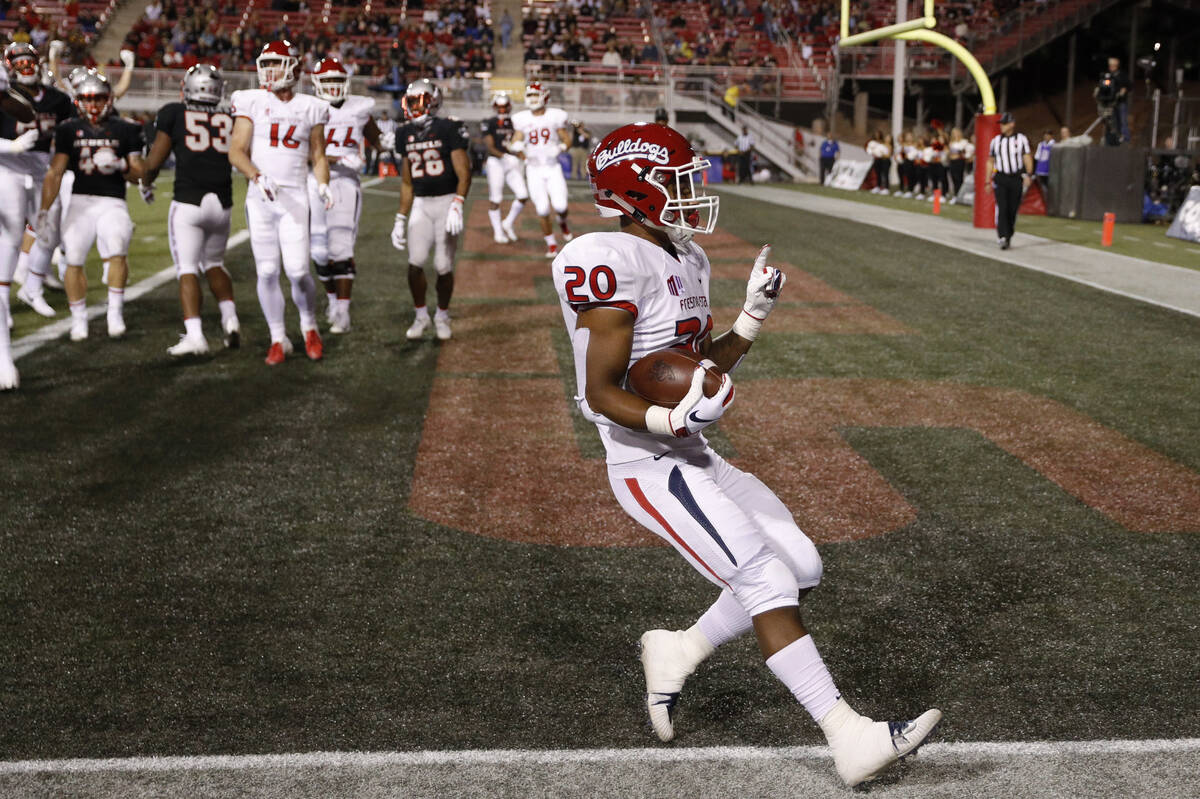 Fresno State Bulldogs running back Ronnie Rivers celebrates scoring a touchdown against the UNL ...