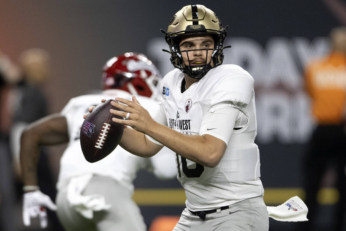 East quarterback Aidan O'Connell of Purdue prepares to throw during the first half of the East ...