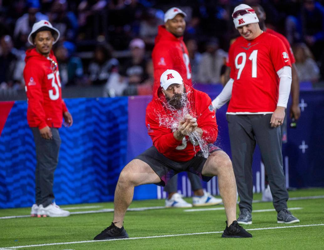 The AFC's Mitch Morse (60) with the Bills has his balloon explode in the splash catch event dur ...