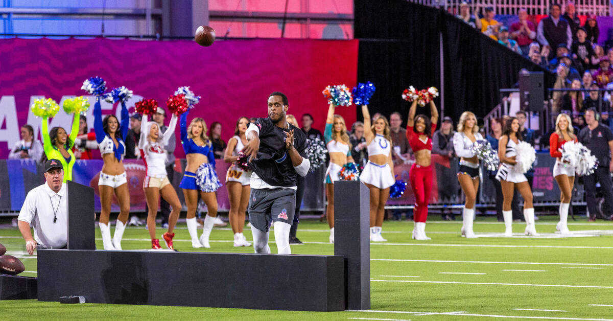 The NFC's Geno Smith (7) of the Seahawks fires a pass at a target during a precision pass event ...