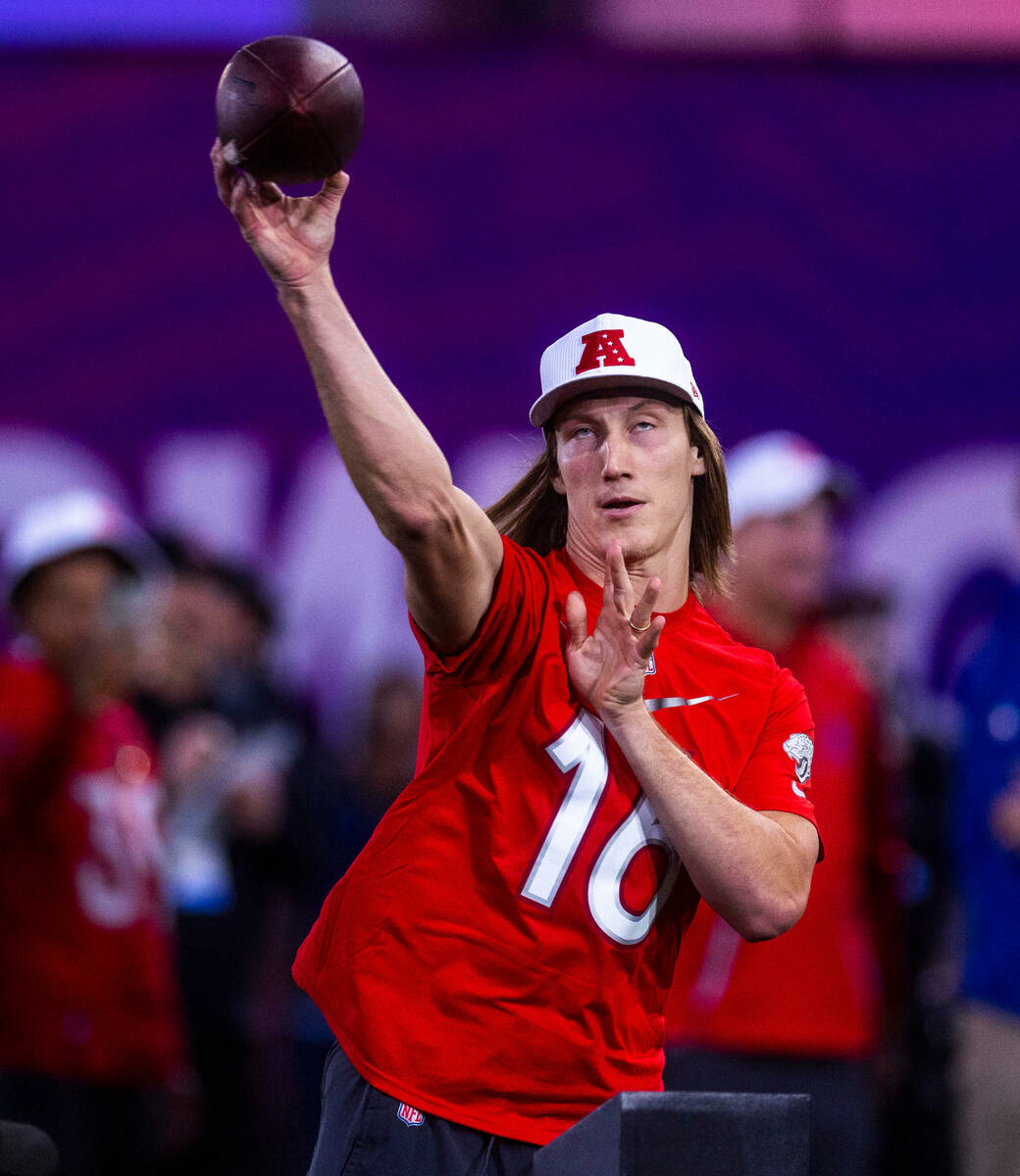 The AFC's Trevor Lawrence (16) with the Jaguars gets off a throw in a precision pass event duri ...