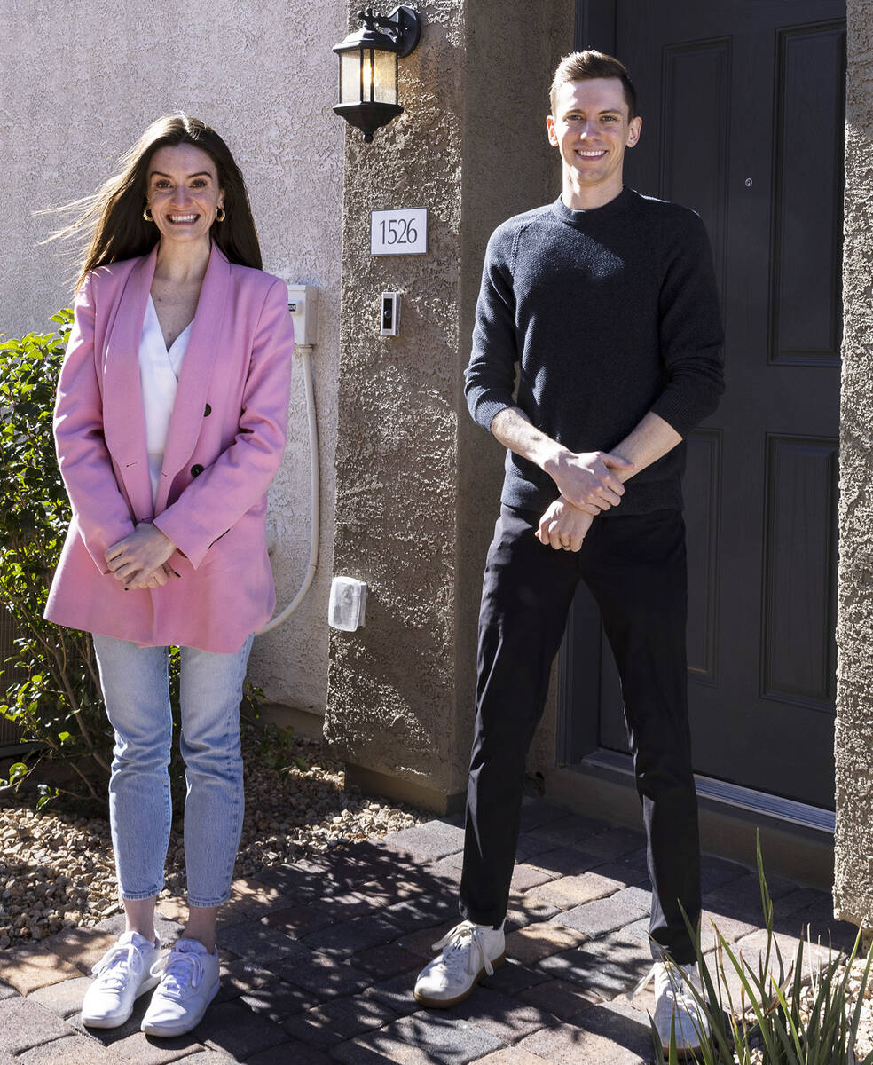 Lauren Self, co-founder and CEO of Roots Homes, and Sam Barsness, co-founder, pose for a photo ...