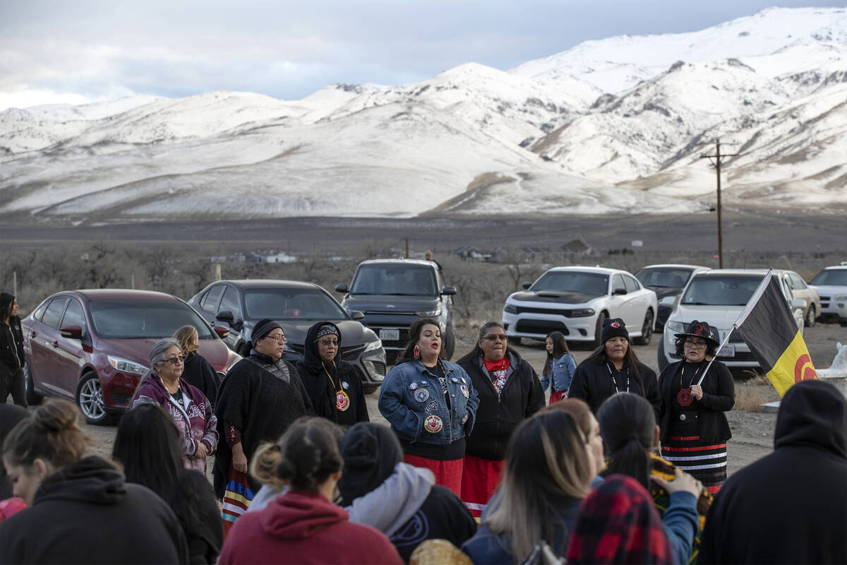 A group from the American Indigenous Movement sings the Women’s Warrior Song during a me ...