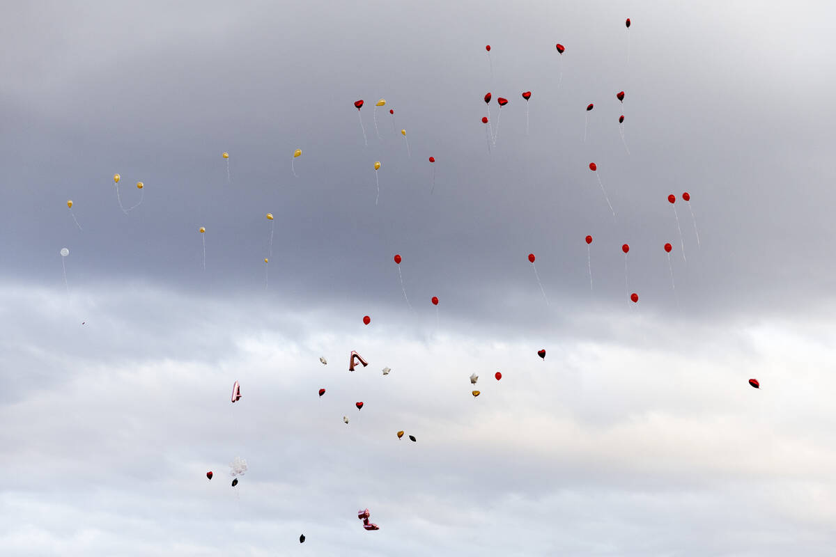Balloons float into the sky in honor of Anna Scott, a member of the Pyramid Lake Paiute Tribe, ...