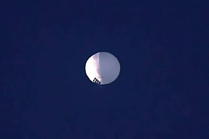 A high-altitude balloon floats over Billings, Mont., on Wednesday, Feb. 1, 2023. The U.S. is tr ...