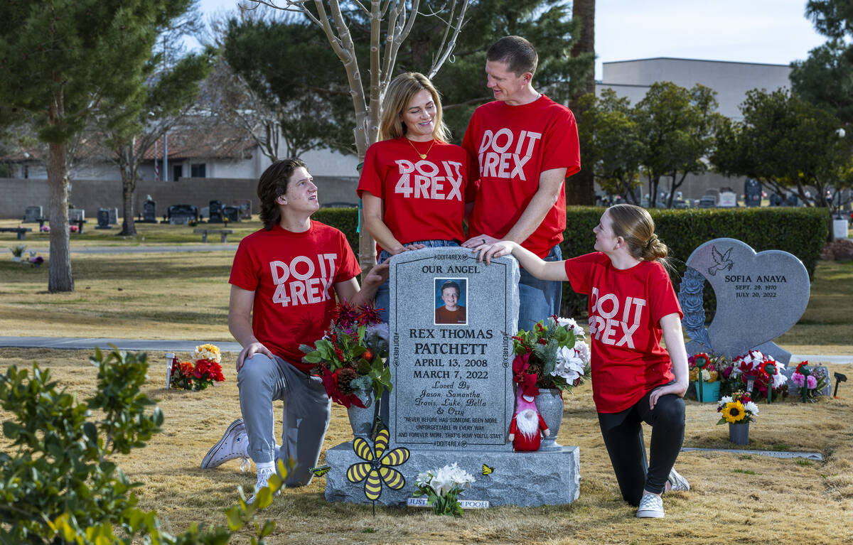 (LtoR) Luke, 17, Samantha, Jason and Bella Patchett, 12, around the headstone of their deceased ...