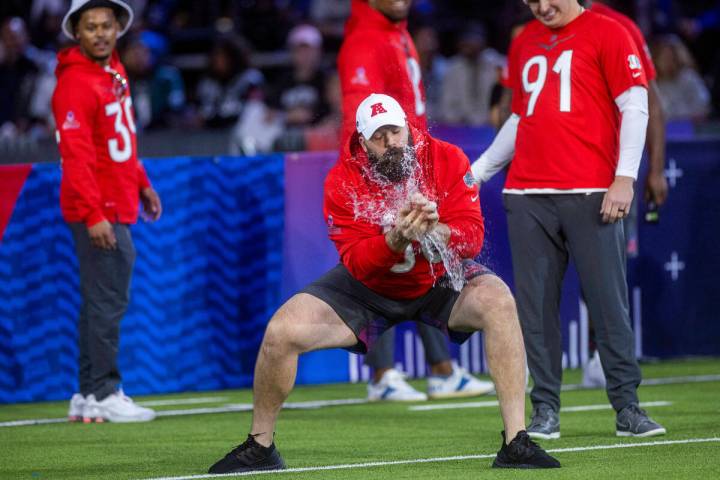 The AFC's Mitch Morse (60) with the Bills has his balloon explode in the splash catch event dur ...