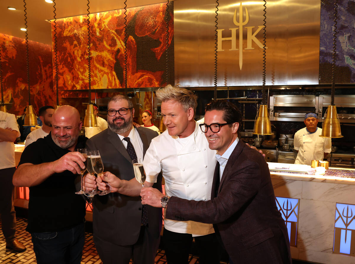 Chef Gordon Ramsay, second from right with, from left, 2 millionth guest, Khaled Aldada of Mor ...