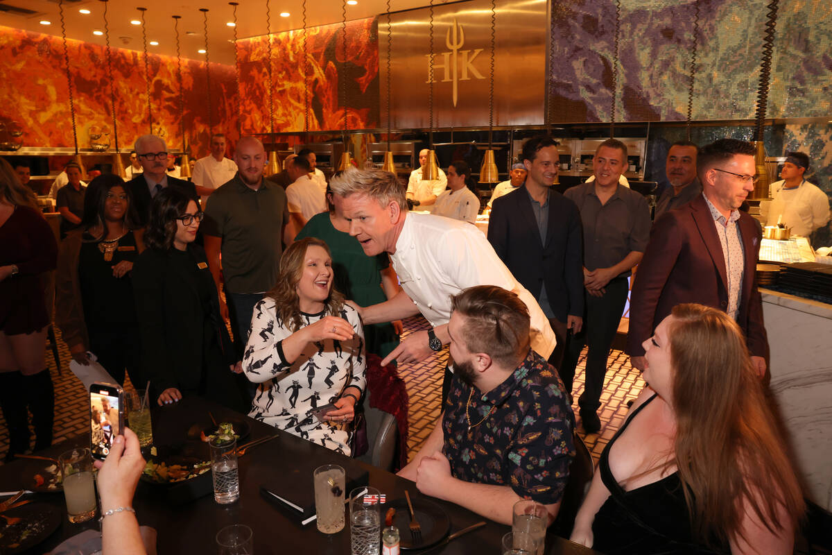 Chef Gordon Ramsay speaks to guests at his Hell’s Kitchen restaurant at Caesars Palace on the ...