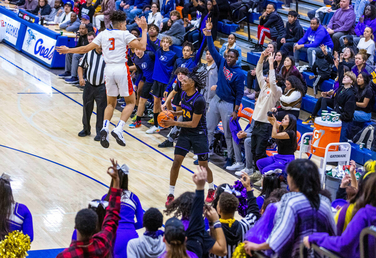 Bishop Gorman guard John Mobley Jr. (3) leaps to block a possible shot in the corner by Durango ...