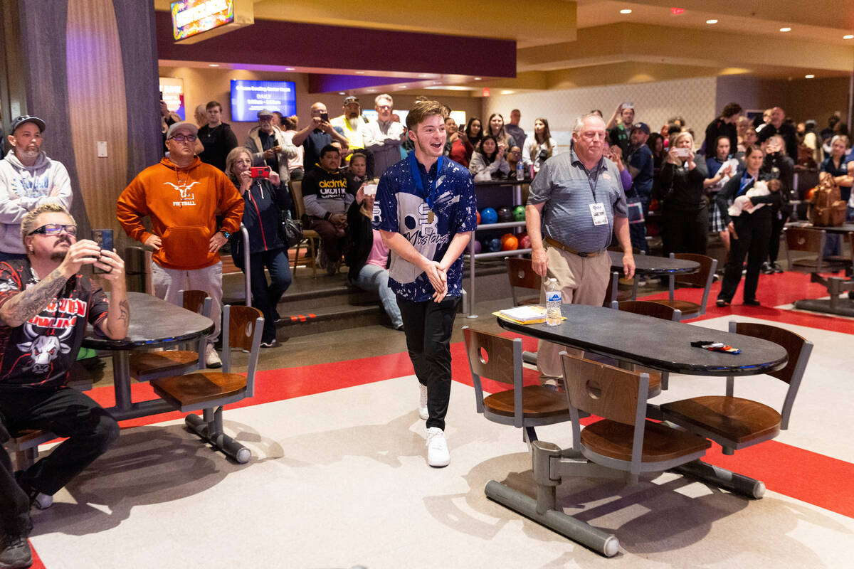 Shadow Ridge's Seth Stovall celebrates his win in the high school boy's 5A bowling state indivi ...
