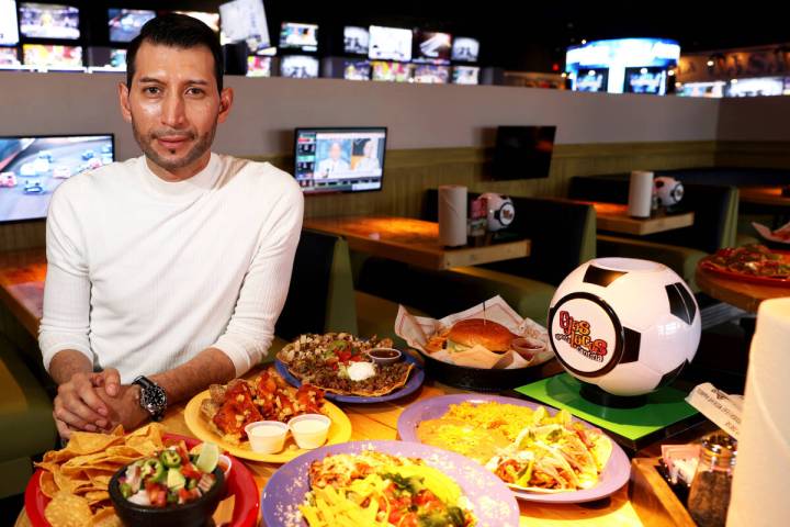 Vice President of Operations Omar Benitez with food offerings at the new Ojos Locos Sports Cant ...