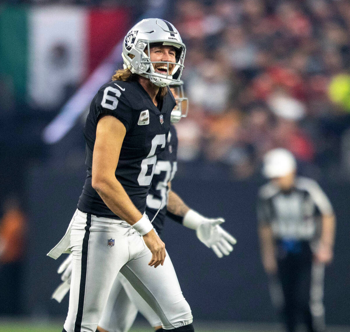 Raiders punter AJ Cole (6) celebrates a 63-yard punt against the Kansas City Chiefs during the ...