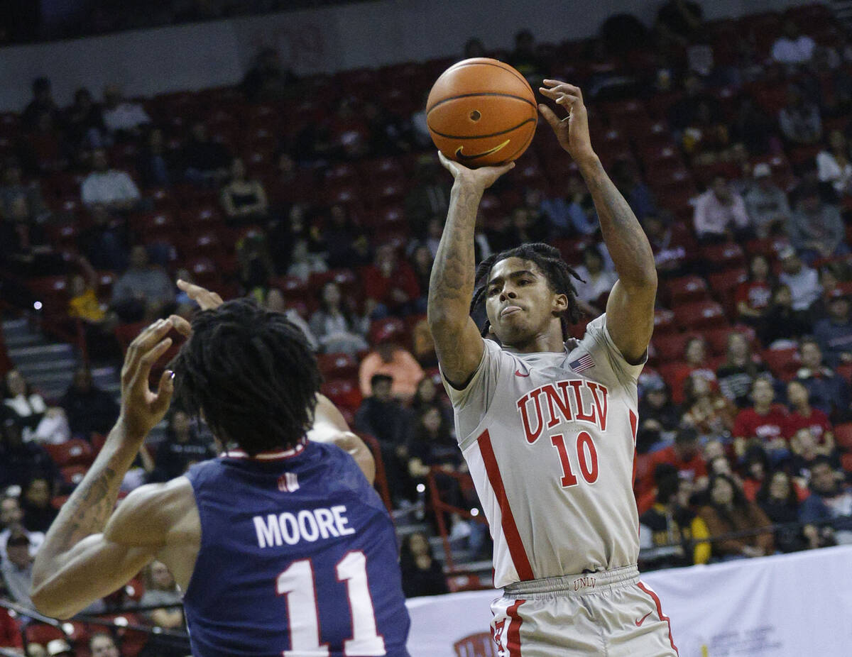 during the first half of an NCAA college basketball game at the Thomas & Mack Center, Frida ...