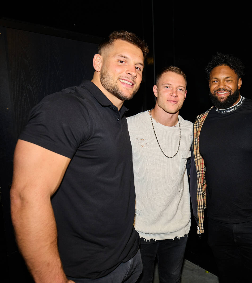 Nick Bosa, Christian McCaffrey and Maurice Hurst of the San Francisco 49ers are shown with supe ...